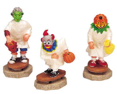 Three Kids On Skateboards