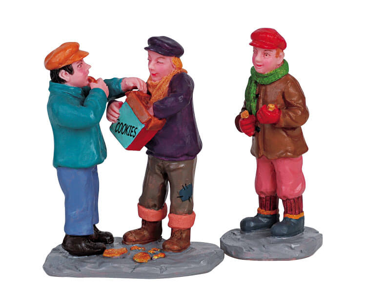 Kids Finishing Christmas Cookies